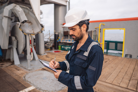 Marine Deck Officer or Chief mate on deck of vessel or shipの写真素材