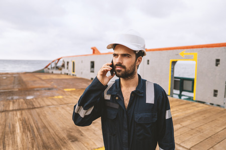 Marine Deck Officer or Chief mate on deck of vessel or shipの写真素材