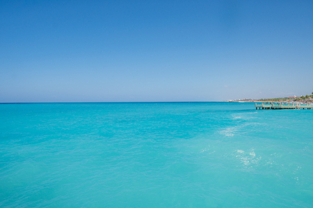 tropical paradise ocean beach with blue waterの写真素材