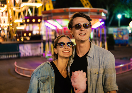 Lovely young hipster couple dating during summer sunset.の写真素材