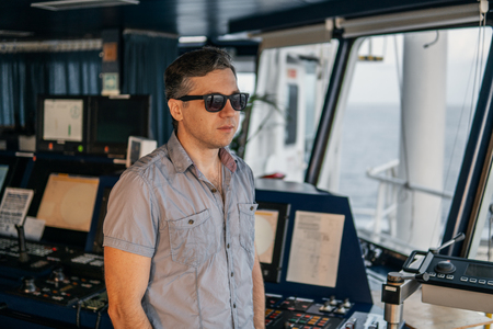 Marine navigational officer or chief mate on navigation watchの写真素材