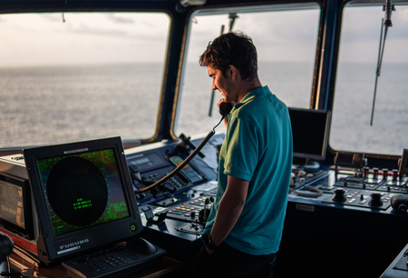 Marine navigational officer is reporting by VHF radioの写真素材