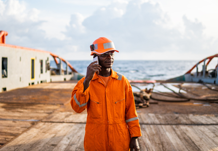 Marine seaman or bosun on deck of vessel or shipの写真素材