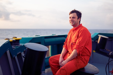 Deck Officer on deck of offshore vessel or shipの写真素材