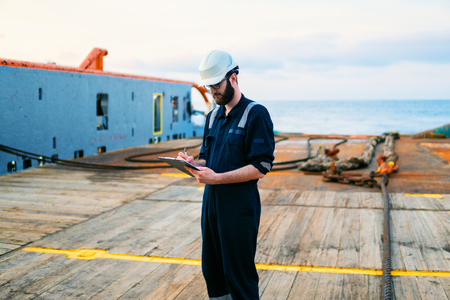 Deck Officer on deck of offshore vessel or shipの写真素材