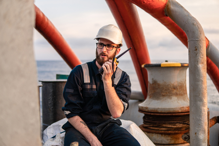 Deck Officer on deck of offshore vessel or shipの写真素材