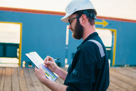Deck Officer on deck of offshore vessel or shipの写真素材