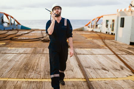 Deck Officer on deck of offshore vessel or shipの写真素材