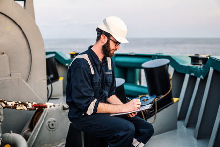 Deck Officer on deck of offshore vessel or shipの写真素材