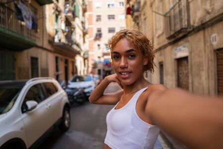sexy shemale woman posing and doing selfieの写真素材