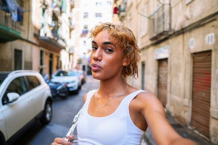 sexy shemale woman posing and doing selfieの写真素材