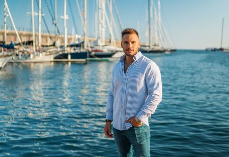 Young rich man at Yacht Club. Businessman is Relaxingの写真素材
