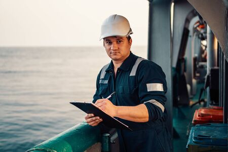 Deck Officer on deck of offshore vessel or ship , wearing PPEの写真素材