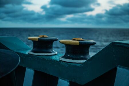 Ship mooring equipment at sea. Warping Rollers painted with yellow.の写真素材