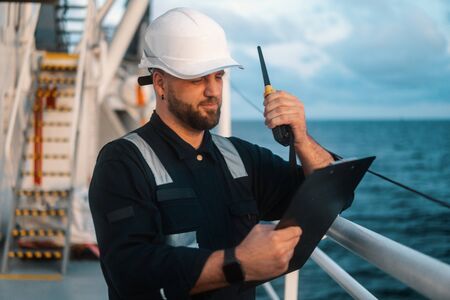 Marine Deck Officer or Chief mate on deck of offshore vessel or shipの写真素材