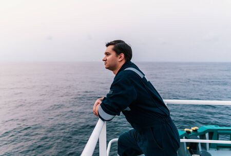 Marine Deck Officer or Chief mate on deck of offshore vessel or ship , wearing PPEの写真素材
