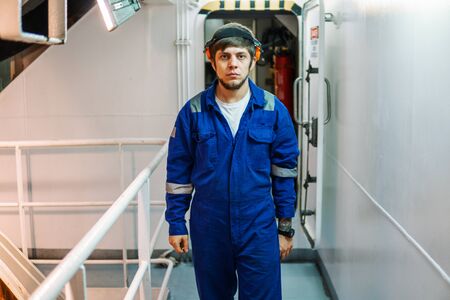 Marine engineer works on the ship. Seamens workの写真素材