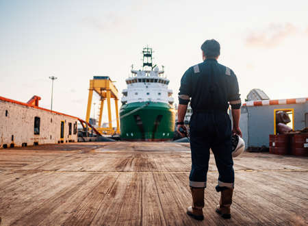 Marine Deck Officer or Chief mate on deck of offshore vessel or shipの写真素材
