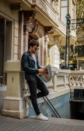 Portrait of sexy man near subway metro station entranceの写真素材