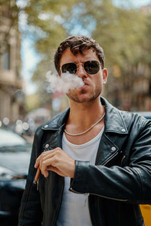 Portrait of sexy man near subway metro station entranceの写真素材