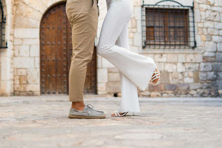 Crop couple standing together in old cityの写真素材