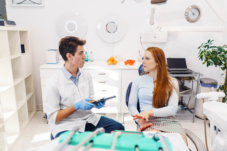 Man and woman in modern dentist officeの写真素材
