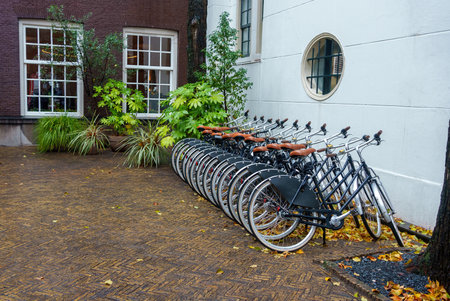 Plenty bicycles at parking lot in Amsterdamの写真素材