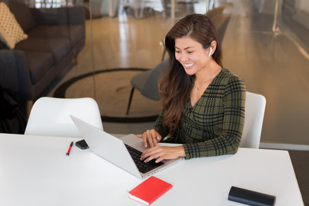 Content Asian worker with laptop in officeの写真素材