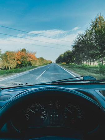 View from the driver's seat of a car on the road.の写真素材