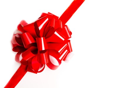 Red bow isolated on white backgroundの写真素材