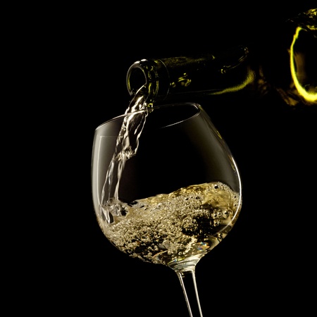 white wine ona a black backgroundの写真素材