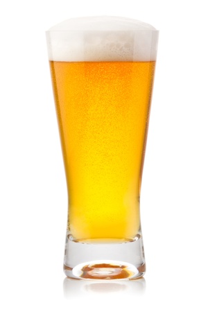 Beer into glass isolated on whiteの写真素材