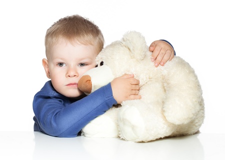 Cute little boy with bearの写真素材