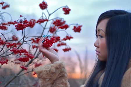 Beautiful woman look on berryの写真素材