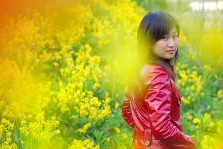 Beautiful asian girl in red outdoorsの写真素材