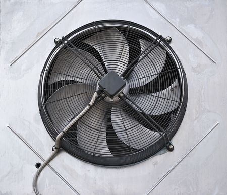 Industrial fan in the wallの写真素材