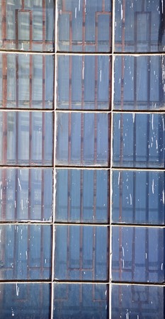 Old dirty window in blocksの写真素材