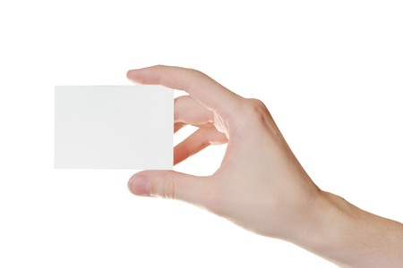 Paper card in man hand isolated on white backgroundの写真素材