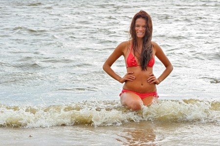 Woman in bikini at the seaの写真素材