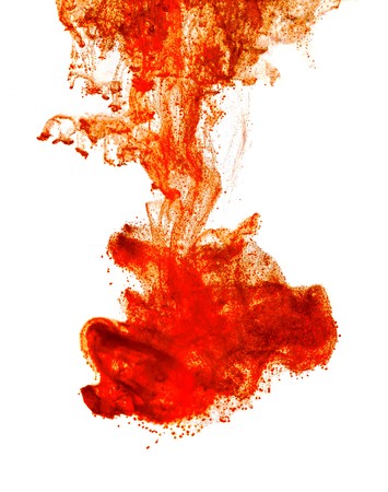 Ink of blood in water isolated backgroundの写真素材