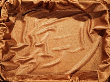 Cloth background in golden colorの写真素材