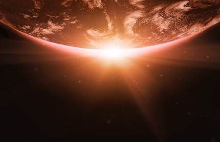 Planet earth with sunrise in the spaceの写真素材