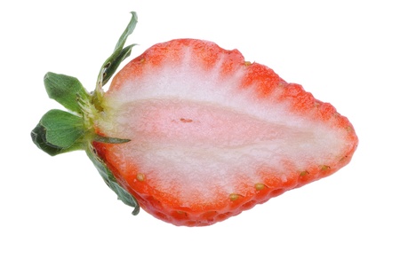 Halved strawberry isolated on white background の写真素材