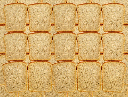 Slices of dark bread as backgroundの写真素材