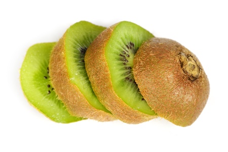 Ripe kiwi slices isolated on white backgroundの写真素材