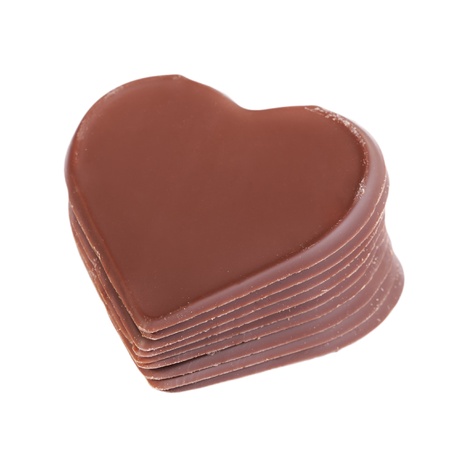 Heart shaped chocolate isolated on whiteの写真素材