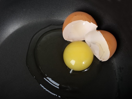 Egg yolk detail on black background