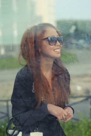 Portrait of asian woman outdoor from glassの写真素材