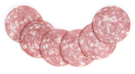 Sliced sausage isolated on whiteの写真素材