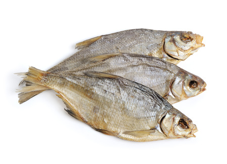 Dry fishes isolated on white backgroundの写真素材